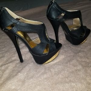 Black and gold heels